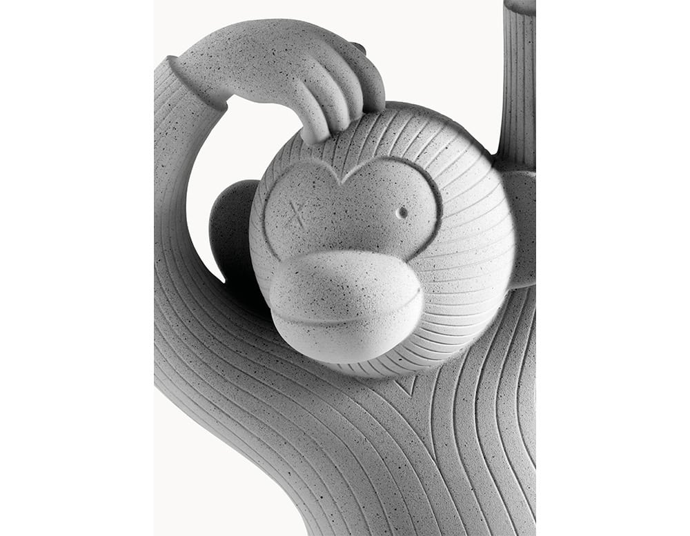 Monkey Side Table’s playful face, sculpted with soft curves and a textured stone-like finish. The figure holds one hand to its head, adding a whimsical, relaxed character to the piece.
