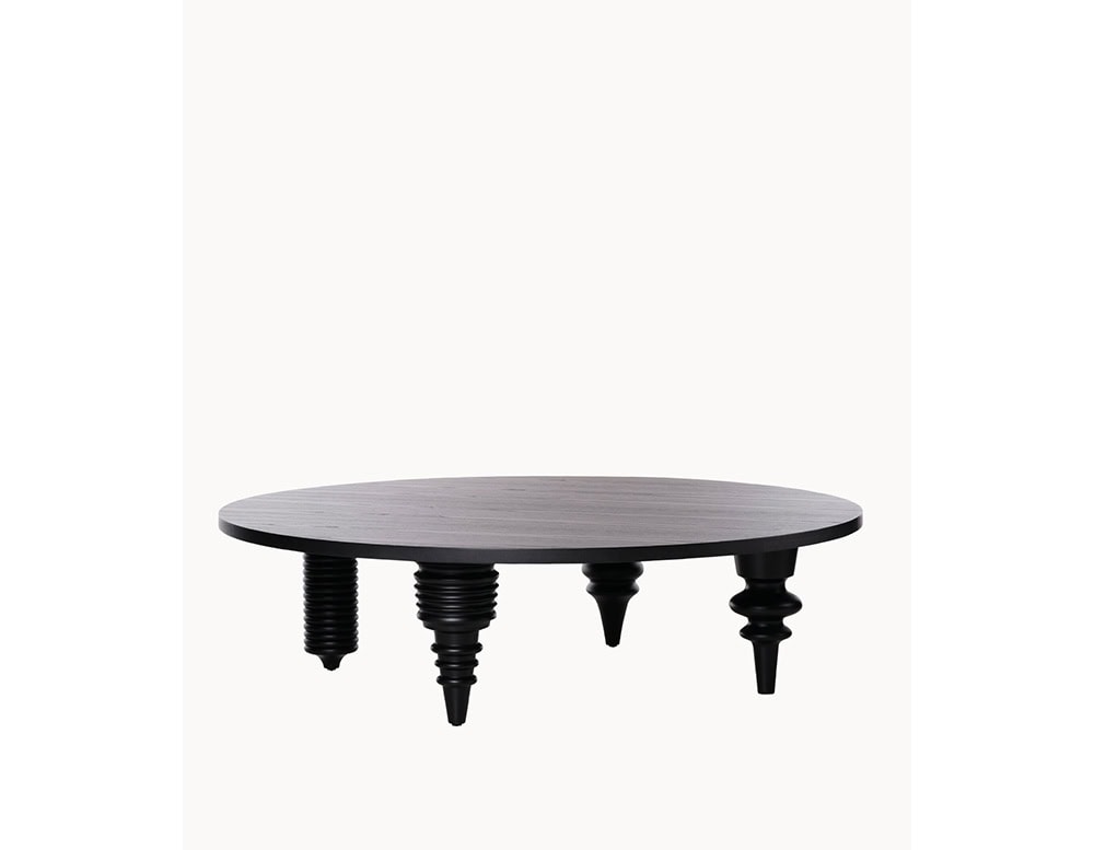 Multileg Coffee Table in black-stained wood with eclectic, mismatched sculptural legs. A bold, artistic centerpiece that blends humor and high design.