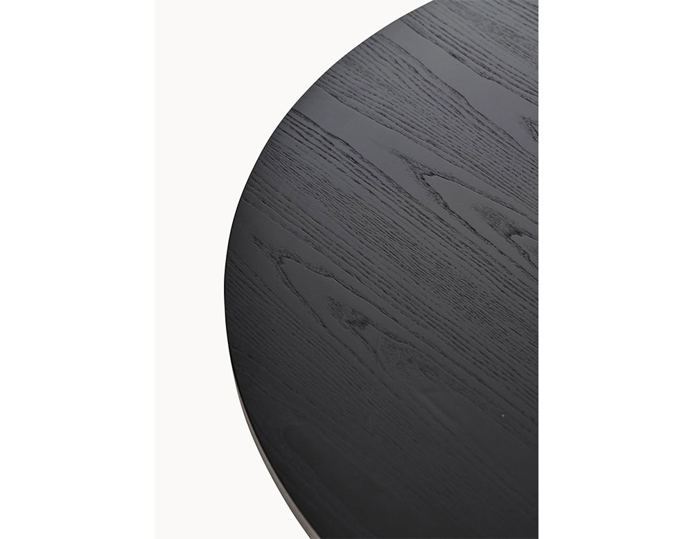 Multileg Coffee Table in black stained ash. Detail view highlights the richly textured grain and rounded edge craftsmanship. A modern surface with artisan appeal.