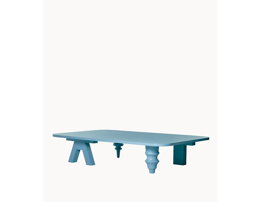 Multileg Coffee Table in matte blue lacquer with mismatched sculptural legs. This whimsical design merges elegance with playfulness in a contemporary silhouette.