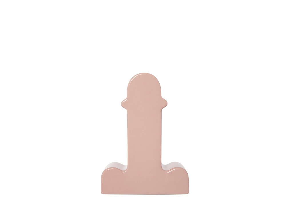 A sculptural ceramic vase finished in a soft blush tone. Its playful, surrealist form features rounded curves and a glossy surface, turning a simple object into an expressive and bold statement piece.