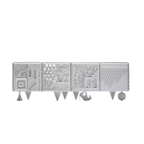 Cabinet with four uniquely textured doors, each showcasing abstract architectural and geometric reliefs, supported by a mix of playful sculptural legs in matte white.