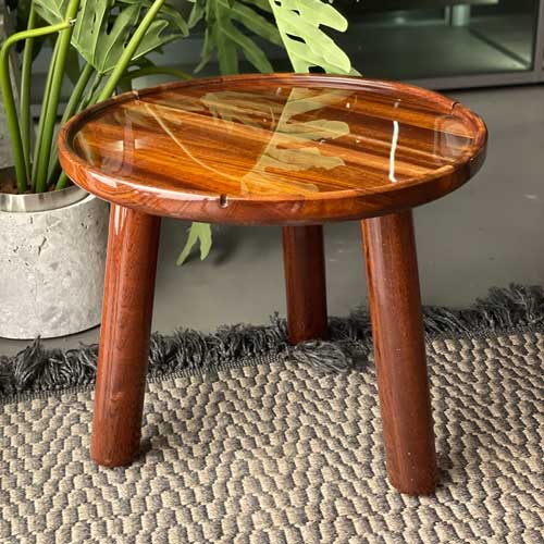 coffee table made of solid mahogany base in a brown tone