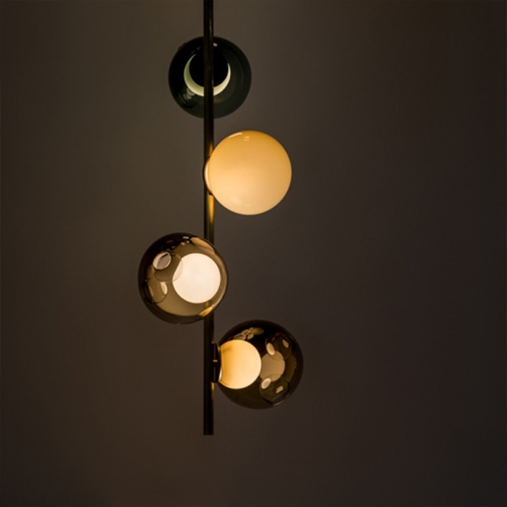 hanging lamps made of steel in a black tone and divided into three lamps