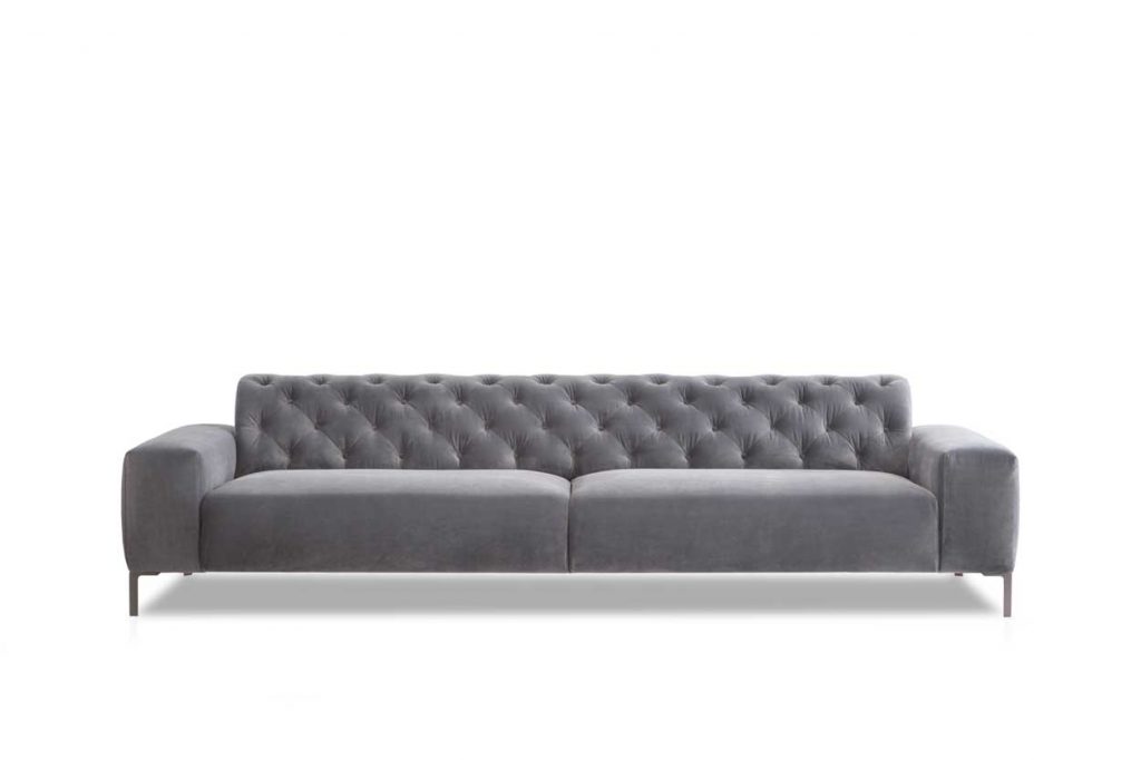 sofa with backrest made of fabric base in a gray color and design with decorative buttons