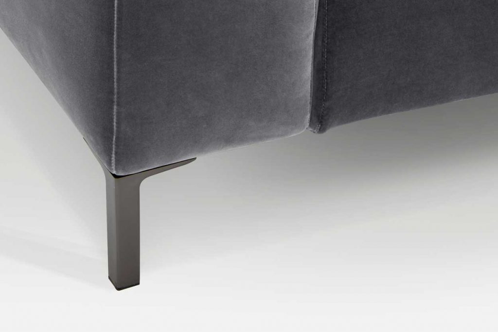 sofa with backrest made of fabric base in a gray color and design with decorative buttons