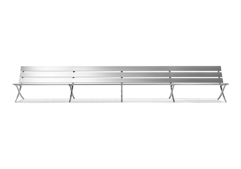 large long bench made of shiny silver steel on a white background