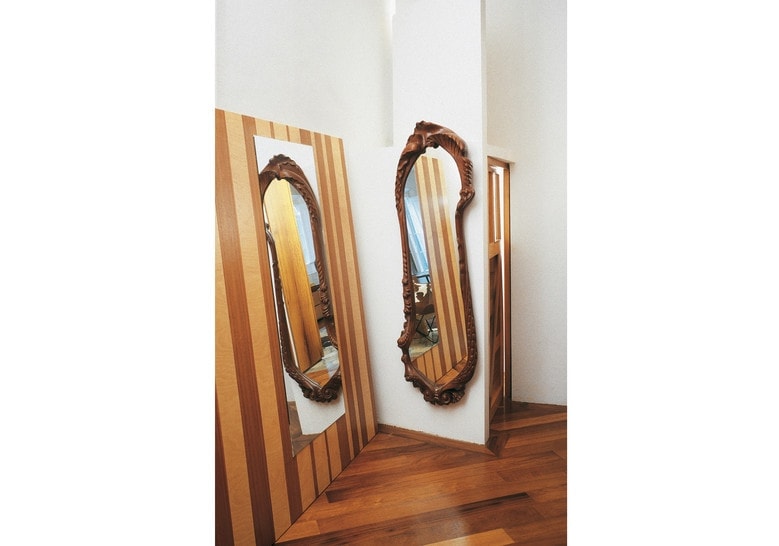 mirror made of oak wood in a dark brown tone
