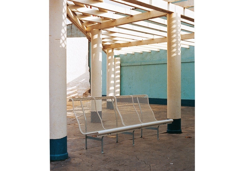 bench made of steel base and folding steel seat in a gray tone