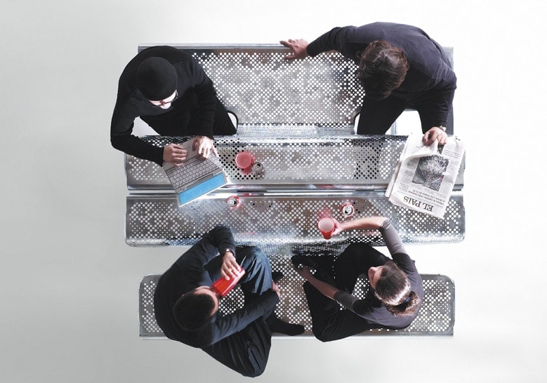 steel bench with table in a silver color tone with background people on a white background