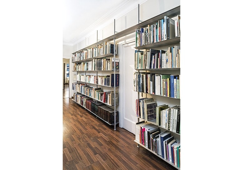 2 long shelves made of aluminum in a gray color with vertical supports
