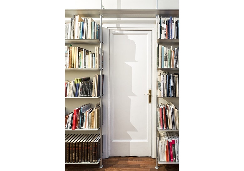 2 long shelves made of aluminum in a gray color with vertical supports