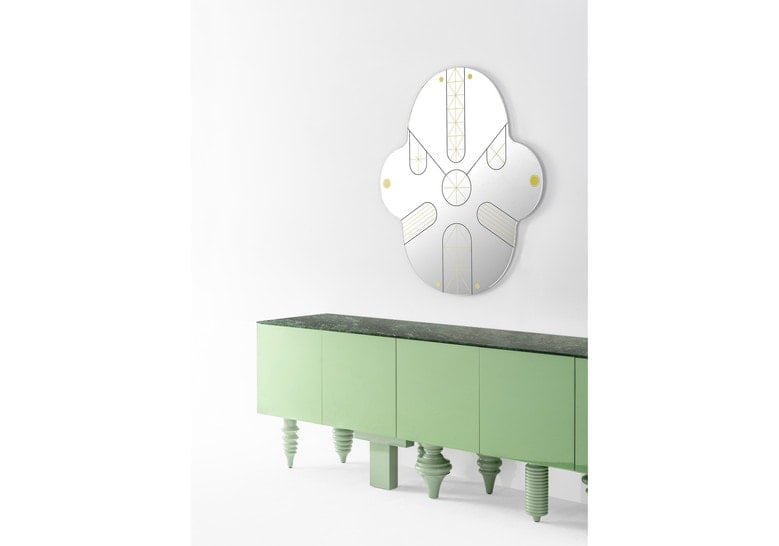 Furniture made of flamed wood in a green tone with front pressure drawers on a white background
