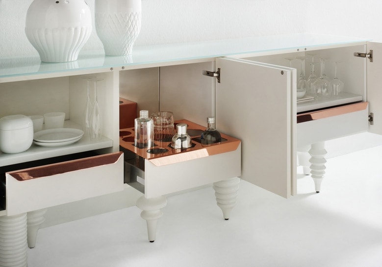 Furniture with front pressure drawers made of flamed wood base in a white color tone on a white background