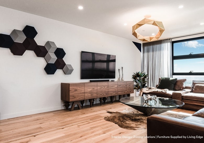 furniture with front pressure drawers made of flamed wood base in a brown tone in a star room