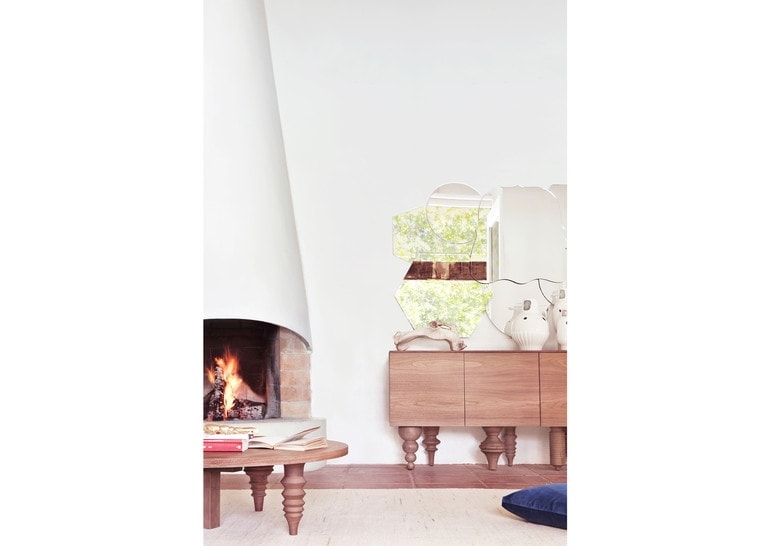 mirror made of 8 small pieces in the shape of geometric figures in a gray color tone