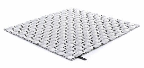 handmade braided rug in a board or brick pattern in a light or dark gray color tone on a white background