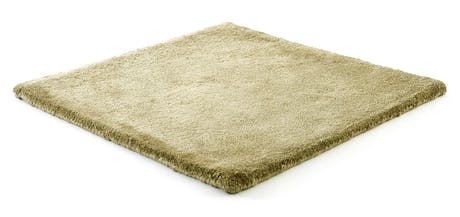raided and hand-woven wool and velvet rug in a lemon green color tone