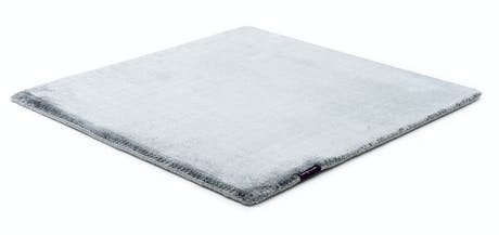 rug made of shiny velvet fabric in a crystal color tone