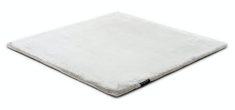 rug made of shiny velvet fabric in a crystal color tone