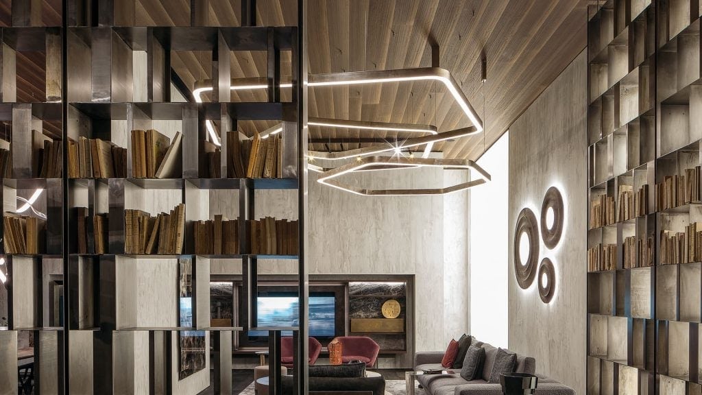 large polygon-shaped ceiling lamp made of steel base in a golden tone