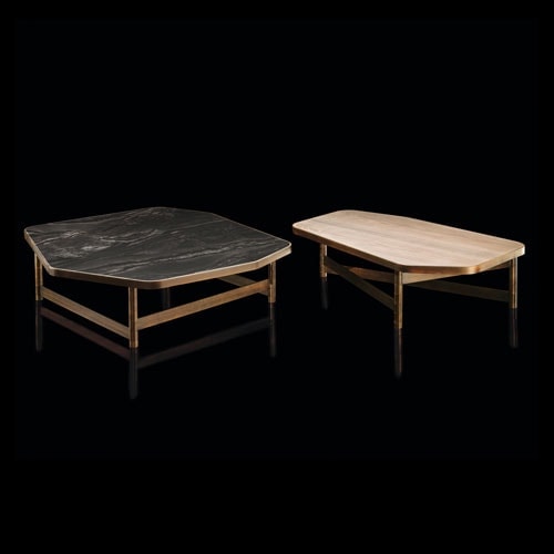 Two OR Tables, structure with an irregular polygon shape and four legs in brass tube, top in wood, left in black and right in white on a black background.