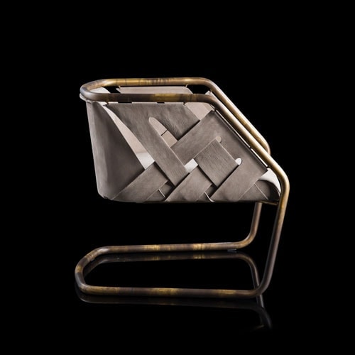 Brown and silver dining chair with a sophisticated and different base for its great design.