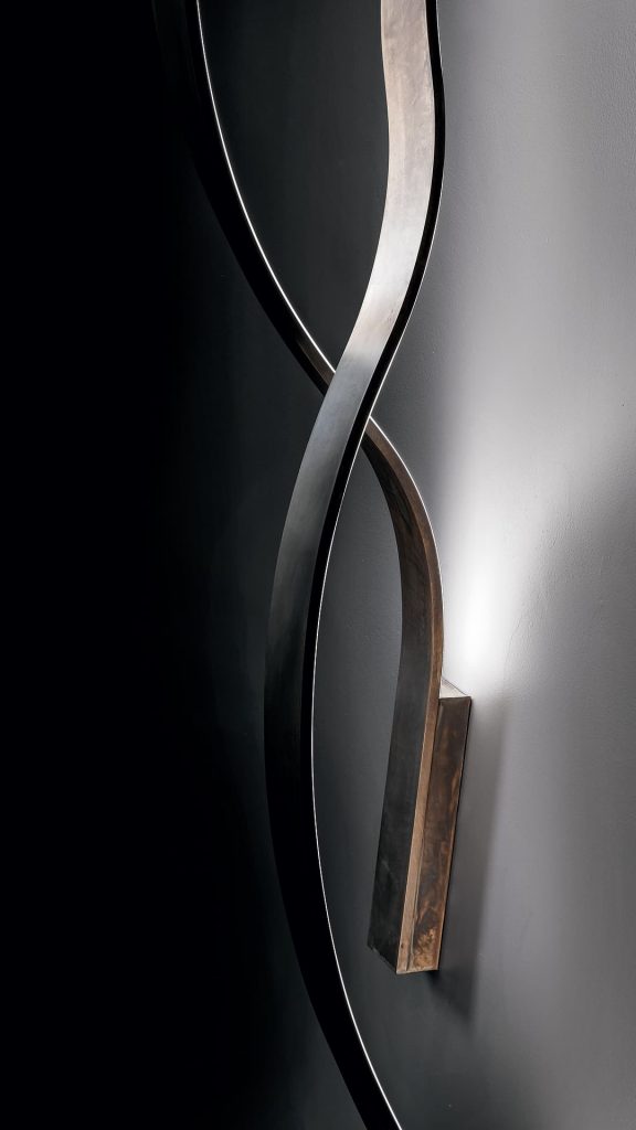lamp made in a curved shape in different panels in a gray color tone
