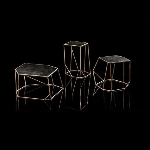 Three W Tables, structure in rod metal color bronze, diamond like shape. Top in black leather on a black background.