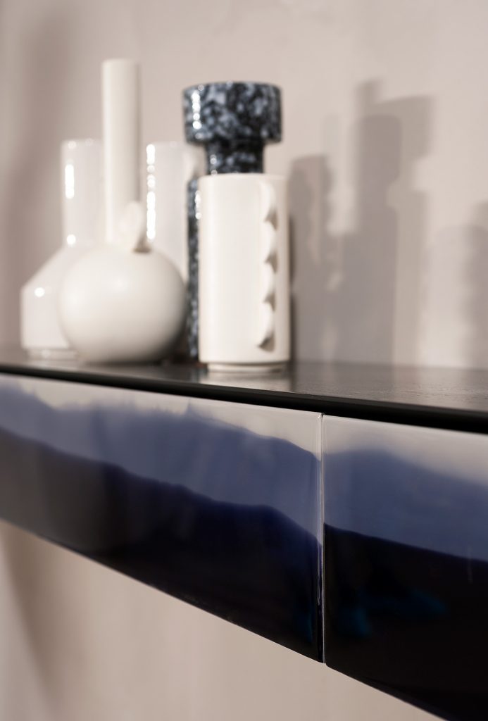 Geometric gradient dark blue marble sideboard.