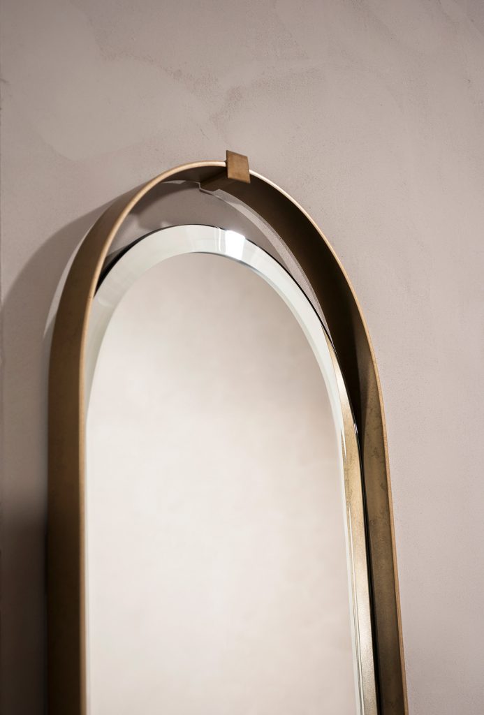 gold mirror on the edges on a gray background
