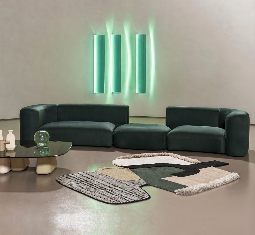 two-part sofa with armrests in a green tone