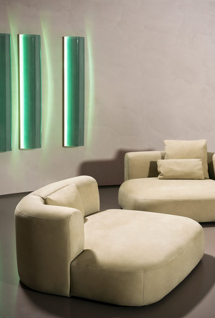 sofa divided into two bases, made of beige fabric and wood