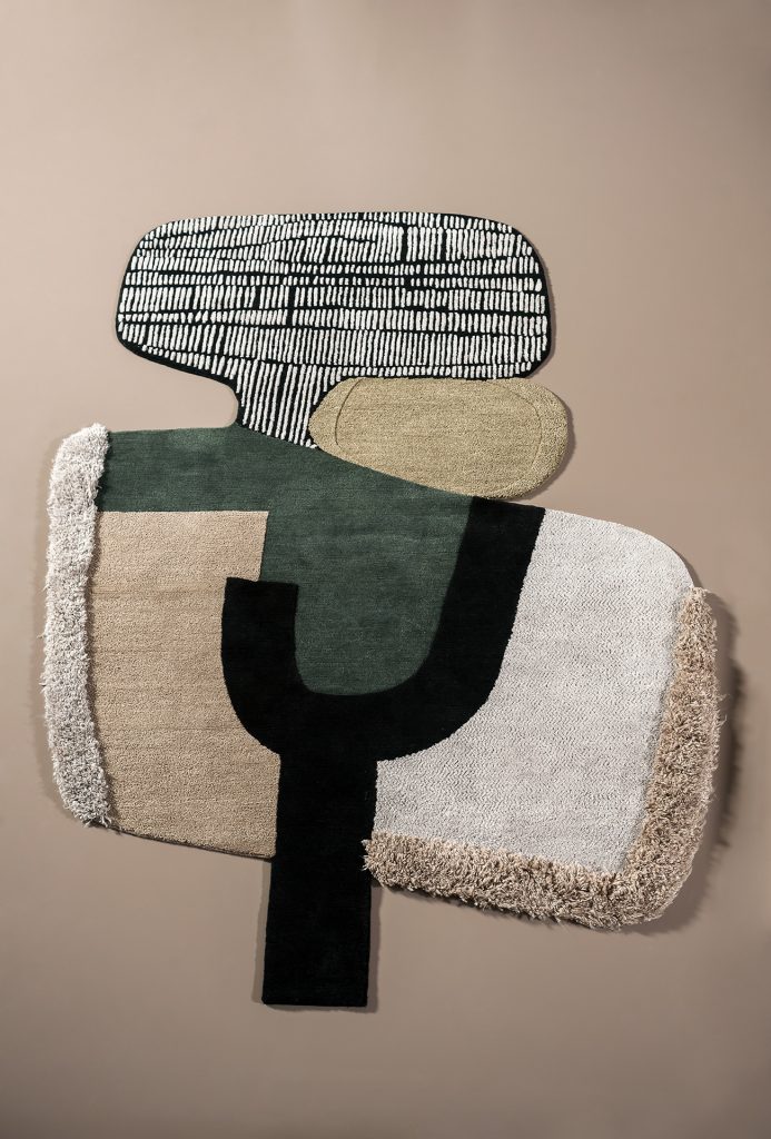 carpet of different and protruding shape colors on beige background.