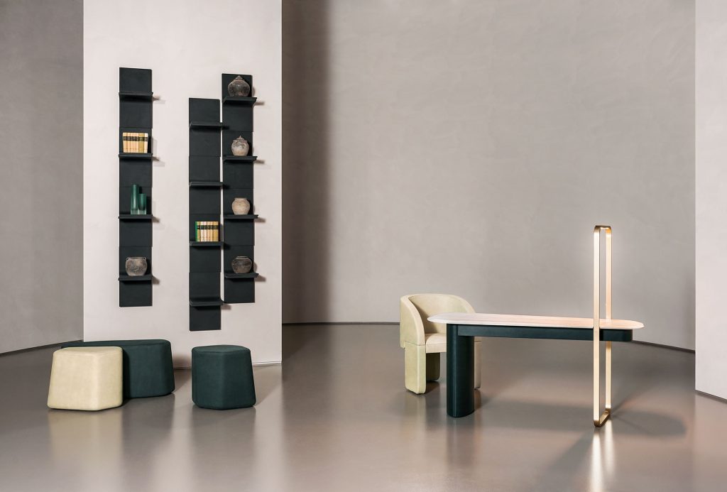 matte black shelf divided into three parts embedded in the wall