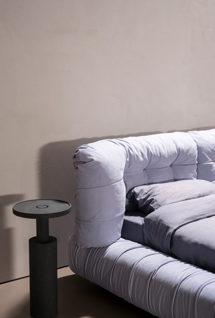 backrest made of fabric foam and wooden base in a light blue tone