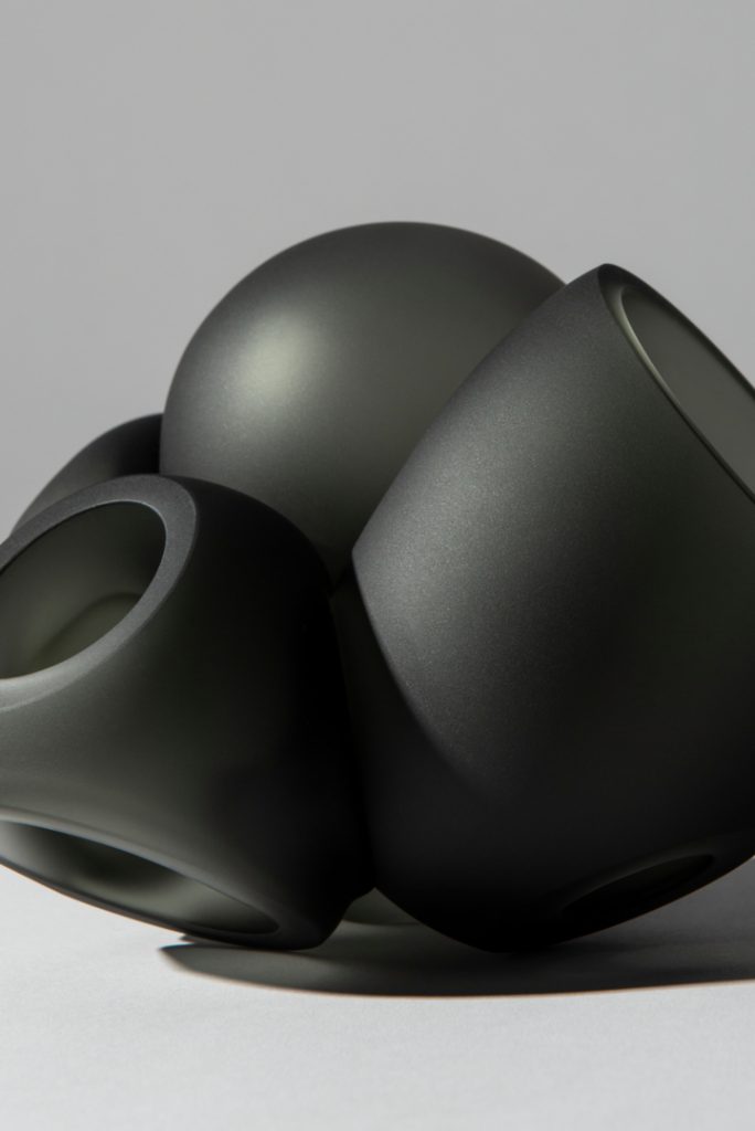 Close up of One Hundred Clear with Gray light with grey background
