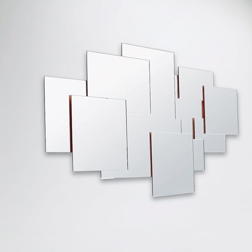 Pablo mirror composed of many rectangular mirrors against a white wall
