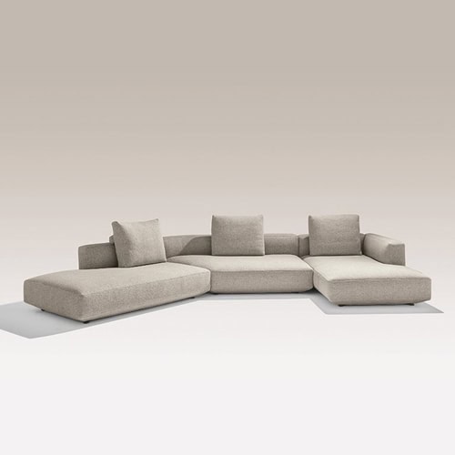 Pianoalto sofa with a minimalist design, featuring light gray upholstery and a low profile on a white background.