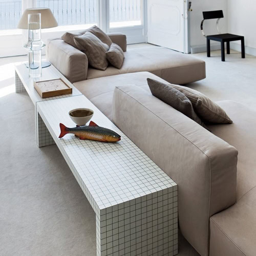 Quaderna bench with a rectangle design, featuring a white grid pattern on all surfaces in a living room.