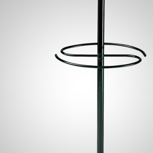 Servopluvio umbrella stand with a minimalist black metal frame and a circular base on a white background.