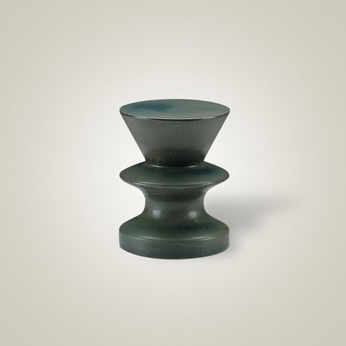 Zeus coffee table with a round wooden top and base in green finish on a black background.