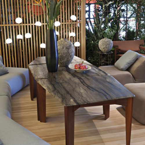 dining room made of solid mahogany base and Sequoia stone top in a tone of gray with black on a room
