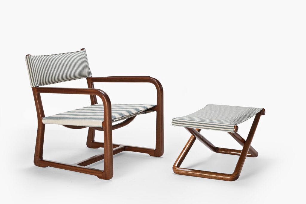movable chairs in wood and green fabric on a white background