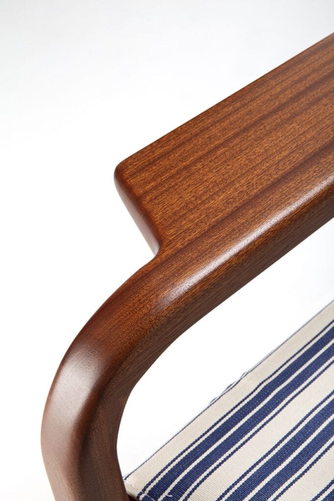 stool with light wood base and upholstered with fabric in different colors a white background