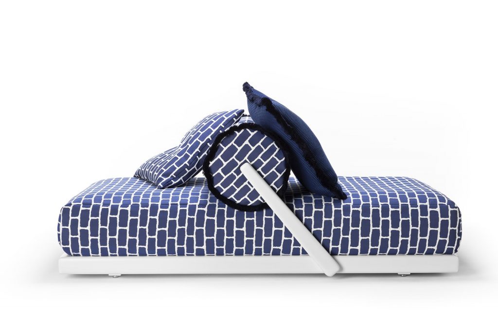 bed for two with white wood finishes and blue design on a white background