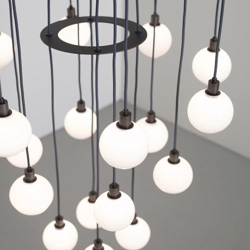 Black and white Drape chandelier with LED lighting.