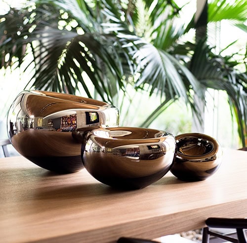 Hand blown glass pots with cut and polished ends.