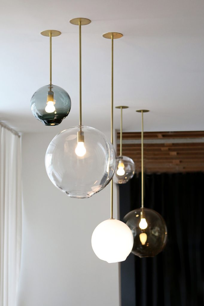 sphere lamps in black, white or transparent glass.