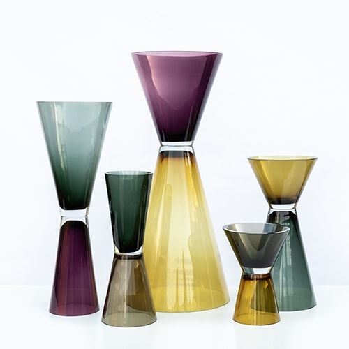 Unique double-sided containers with conical shapes and inverted colors on a white background.